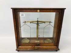 VINTAGE BAIRD AND TATLOCK CASED BALANCE SCALES H 38.5CM.