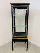 A C19TH EBONISED SINGLE-DOOR CABINET, THE EGG AND DART CORNICE ABOVE A SINGLE DOOR,