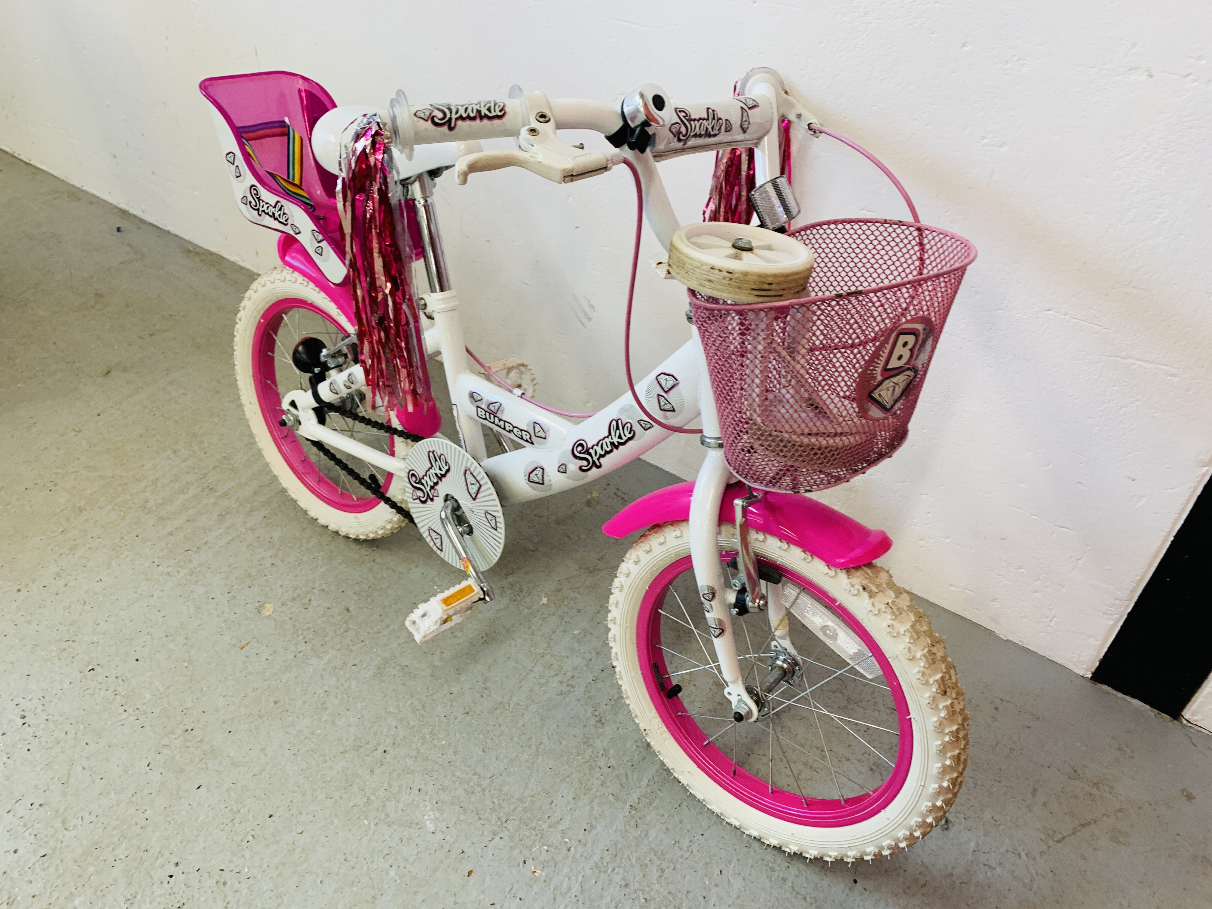 A CHILDS PINK AND WHITE BIKE ALONG WITH STABILIZERS - SOLD AS SEEN - Image 2 of 4