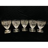 FIVE LATE GEORGIAN ALE GLASSES ENGRAVED WITH A FRUITING VINE, ON A SQUARE BASE HEIGHT 13CM.