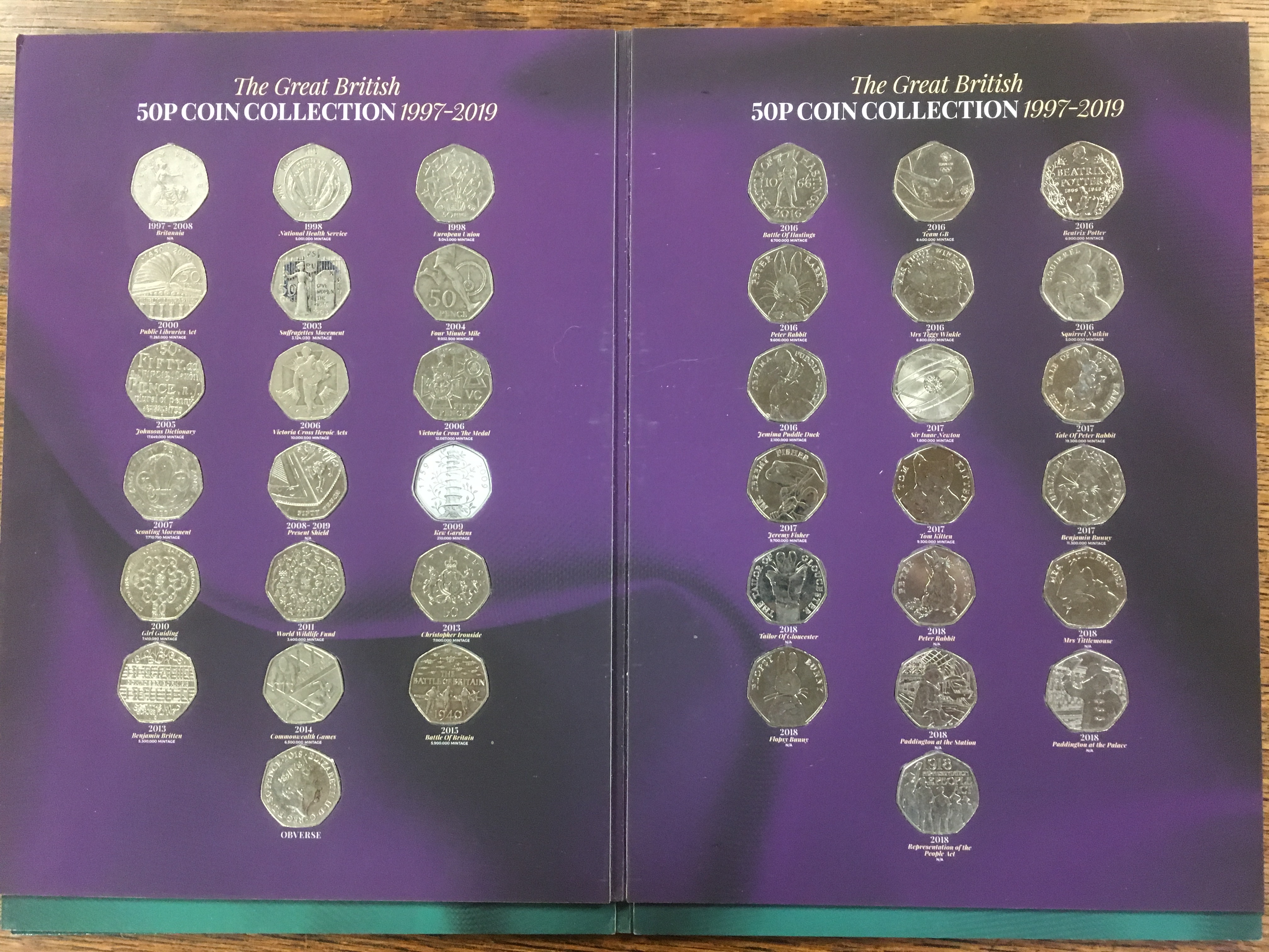 "THE GREAT BRITISH 50p COIN COLLECTION FOLDERS (3), PARTIALLY FILLED,
