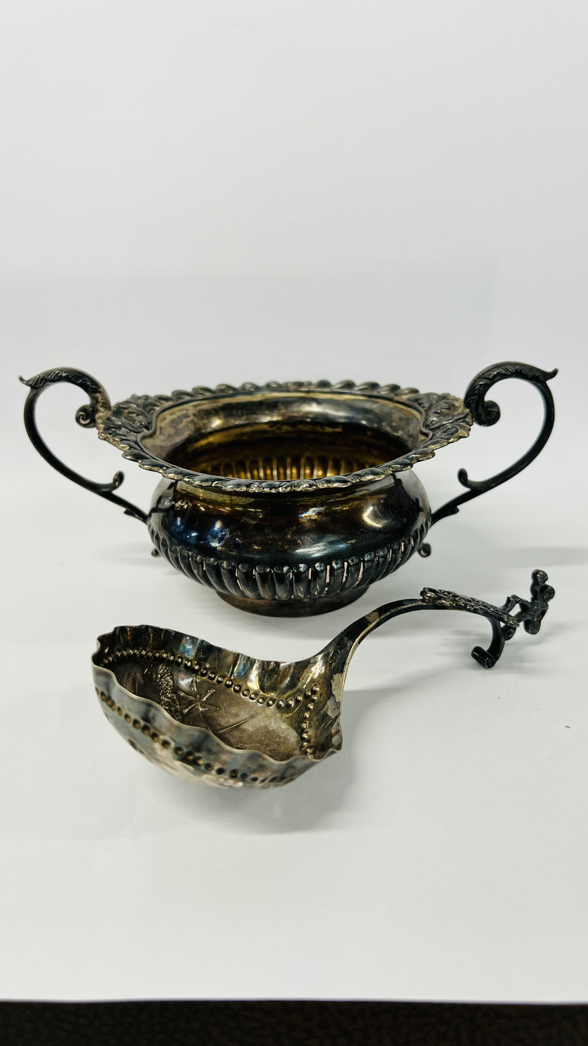 SILVER DUTCH EMBOSSED CADDY SPOON, SILVER TWO HANDLED SUGAR BOWL, LONDON ASSAY.