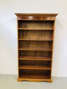 A REPRODUCTION YEW WOOD FINISH FULL HEIGH BOOKSHELF WITH ADJUSTABLE SHELVES WIDTH 110CM. DEPTH 36CM.