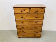 HONEY PINE TWO OVER FOUR DRAWER CHEST.