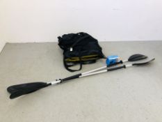 AN INFLATABLE 2 PERSON KAYAK OARS AND COMPRESSOR - SOLD AS SEEN.