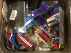 TIN OF MEDALS, RIBBONS, SUSPENDERS, BUTTONS AND BADGES, ETC.