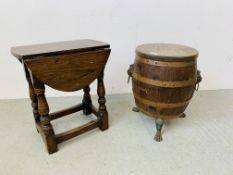 A MINIATURE OAK COPPER BOUND WHISKY BARREL STOOL WITH LION HEAD DETAIL (HEIGHT 42CM.