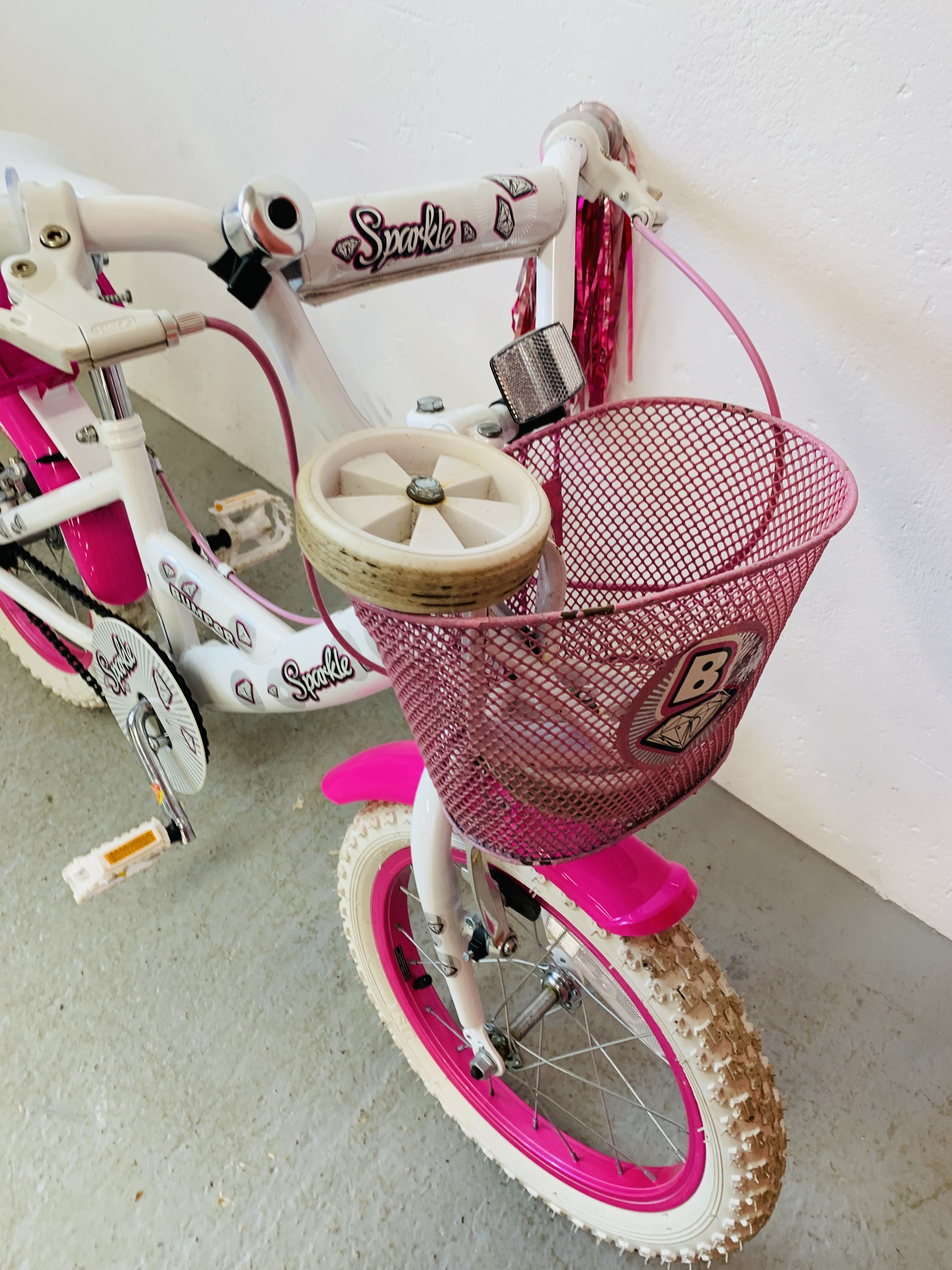 A CHILDS PINK AND WHITE BIKE ALONG WITH STABILIZERS - SOLD AS SEEN - Image 3 of 4