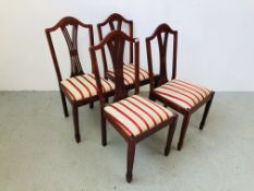 A SET OF FOUR HARDWOOD DINING CHAIRS WITH REGENCY STRIP CUSHIONED SEATS.