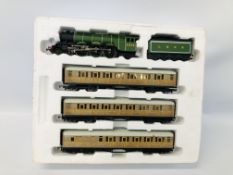 HORNBY 00 GAUGE FLYING SCOTSMAN 4472 LOCOMOTIVE AND TENDER ALONG WITH THREE LNER CARRIAGES.