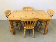 A HONEY PINE DINING TABLE WITH FOUR PINE DINING CHAIRS