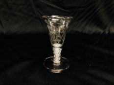 A LATE GEORGIAN FIRING GLASS, ENGRAVED WITH FLOWERS AND MASONIC SYMBOLS HEIGHT 11.5CM.