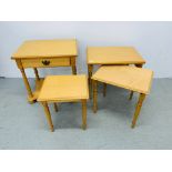 A NEST OF 3 MODERN BEECHWOOD FINISH TABLES AND MATCHING SINGLE DRAWER TABLE WITH SHELF BELOW.