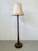 A MAHOGANY BARLEY TWIST STANDARD LAMP AND SHADE