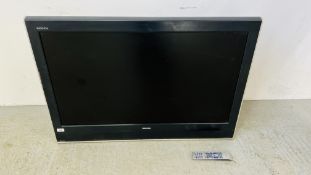 A TOSHIBA REGZA 42 INCH TELEVISION WITH REMOTE AND WALL MOUNTING BRACKET - SOLD AS SEEN.