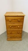 A SOLID PINE WAXED FINISH FOUR DRAWER CHEST WIDTH 61CM. DEPTH 45CM. HEIGHT 106CM.