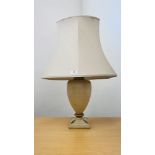 A CLASSICAL STYLED TABLE LAMP, THE CREAM BODY WITH GILT DECORATION SIGNED BONDI - SOLD AS SEEN.