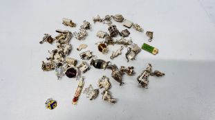 COLLECTION OF 43 ASSORTED WHITE METAL CHARMS ETC.