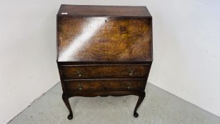 A BURR WALNUT FINISH TWO DRAWER BUREAU WITH FITTED INTERIOR STANDING ON QUEEN ANNE LEG WIDTH 70CM.