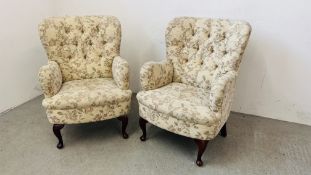 PAIR OF MODERN BUTTON BACK ARMCHAIRS UPHOLSTERED IN A FLORAL FABRIC