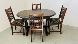 ERCOL STYLE OVAL EXTENDING DINING TABLE ALONG WITH A SET OF FOUR UPHOLSTERED DINING CHAIRS