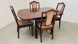 A GOOD QUALITY MAHOGANY FINISH DROP FLAP DINING TABLE AND SET OF FOUR DINING CHAIRS TABLE EXTENDED