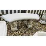 A STONEWORK CURVED SEAT GARDEN BENCH SUPPORTED BY SQUIRRELS LENGTH 110CM.