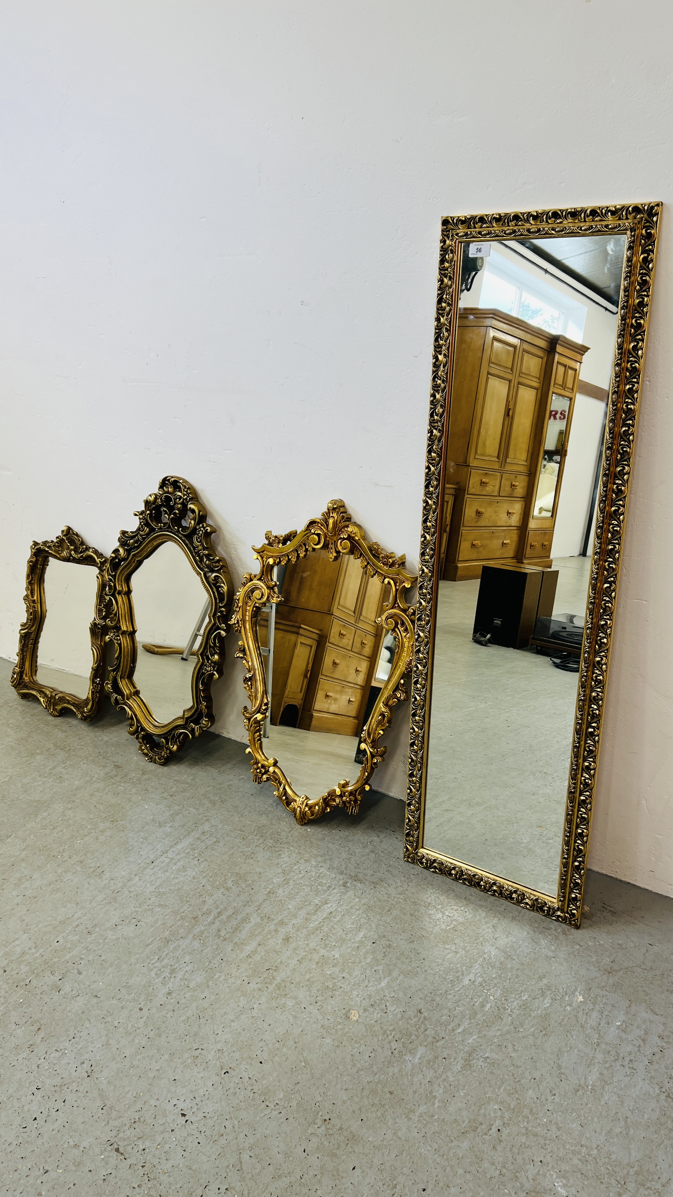 FOUR ORNATE GILT FRAMED DECORATIVE WALL MIRRORS OF VARIOUS DESIGNS