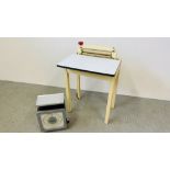 AN ENAMELLED FOLDING TOP TABLE WITH FOLD OUT FLEETWAY PRODUCTS MANGLE A/F ALONG WITH A SET OF AVERY