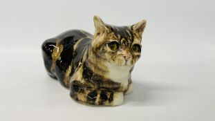 WINSTANLEY LIFE SIZE "TORTOISE SHELL" CAT IN LAYING POISE LENGTH 33CM, HEIGHT 18.5CM.