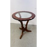 A GOOD QUANITY REPRODUCTION OCCASIONAL TABLE WITH BEVELLED INSERT GLASS TOP SUPPORTED BY THREE