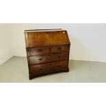 A GEORGE II WALNUT BUREAU, TWO SHORT OVER TWO LONG DRAWERS WITH WELL FITTED INTERIOR WIDTH 92CM.