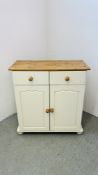 A PINE TWO DRAWER TWO DOOR CREAM PAINTED FRONT SIDEBOARD.