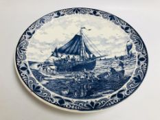 A DELFT BLUE AND WHITE CHARGER OF SHIPPING SCENE DIAMETER 39CM.