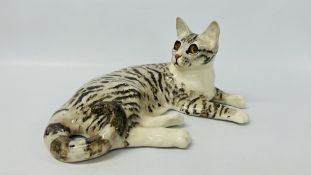WINSTANLEY LIFE SIZE TABBY CAT IN LAYING POISE LENGTH 38CM, HEIGHT 18CM.