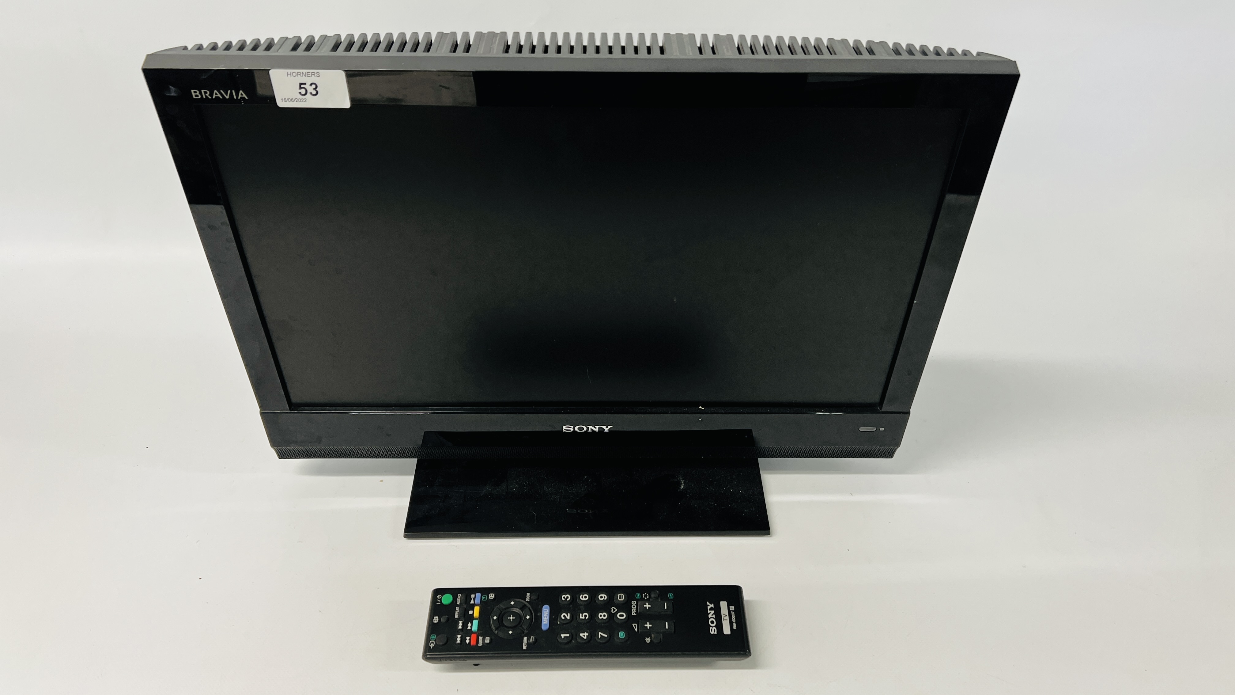 A SONY BRAVIA 19 INCH TELEVISION WITH REMOTE - SOLD AS SEEN
