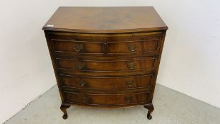 A REPRODUCTION BOW FRONTED FOUR DRAWER CHEST WITH BRUSHING SLIDE WIDTH 80CM. DEPTH 46CM.