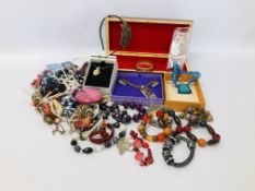 A BOX CONTAINING AN ASSORTMENT OF COSTUME JEWELLERY TO INCLUDE BEADED NECKLACES, BANGLES,