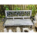 A CAST IRON FRAMED GARDEN BENCH, THE BACK PANEL WITH ROSE DECORATION - LENGTH 125CM.