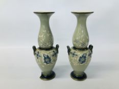 PAIR OF VINTAGE DECORATIVE VASES ON A GREEN GROUND,