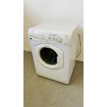 A HOTPOINT AQUARIUS WASHING MACHINE - SOLD AS SEEN.