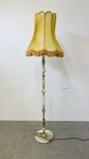 ORNATE BRASS AND ONYX STANDARD LAMP WITH GOLD FRINGED SHADE - SOLD AS SEEN.