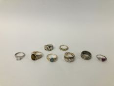 COLLECTION OF EIGHT ASSORTED SILVER DESIGNER DRESS RINGS.