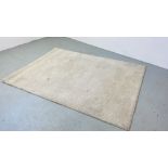 AN ADUM DEEP PILE CREAM RUG 170CM X 240CM.