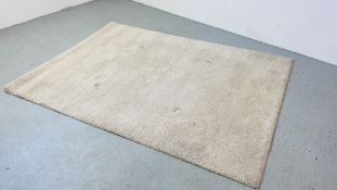 AN ADUM DEEP PILE CREAM RUG 170CM X 240CM.