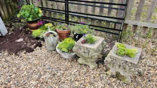 A PAIR OF ORNATE STONEWORK PLANTERS,