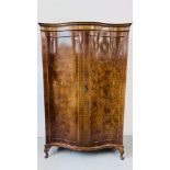 A REPRODUCTION QUEEN ANNE STYLE BURR WALNUT FINISH SERPENTINE FRONT DOUBLE WARDROBE HEIGHT 200CM.