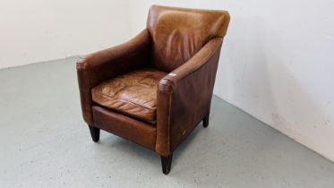 A GOOD QUALITY TAN LEATHER CLUB CHAIR WITH STUDDED DETAIL.