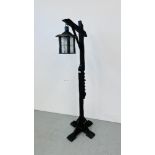A FREE STANDING ADJUSTABLE LANTERN ON HARDWOOD STAND (CABLE REMOVED)