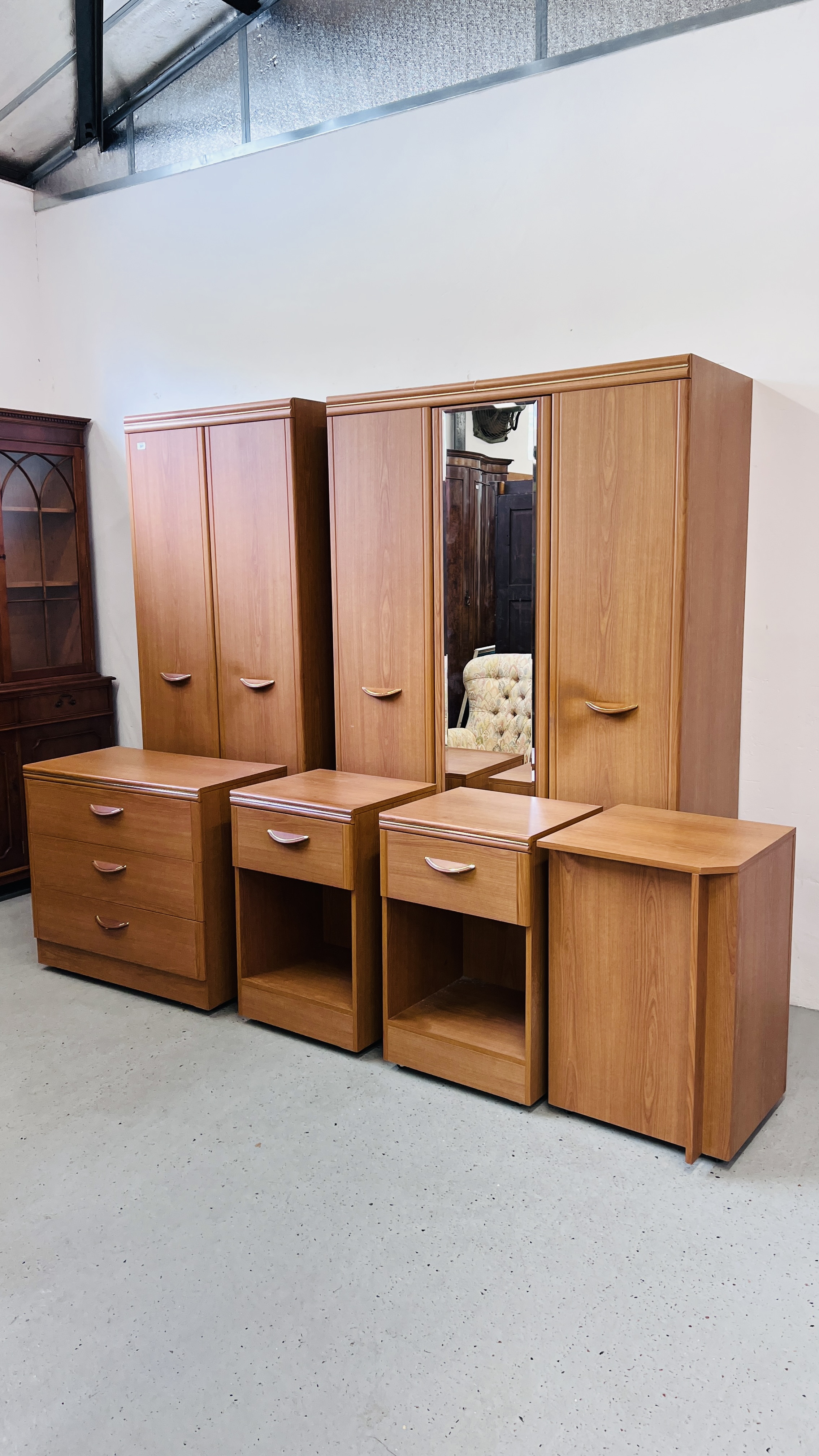 A SUITE OF ALSTONS CHERRYWOOD FINISH BEDROOM FURNITURE COMPRISING OF DOUBLE WARDROBE WITH TWO